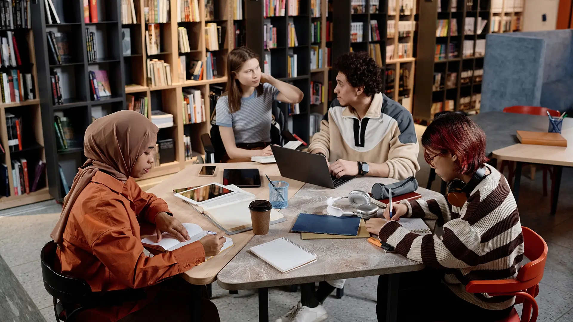 Books and maps representing learning about Ontario